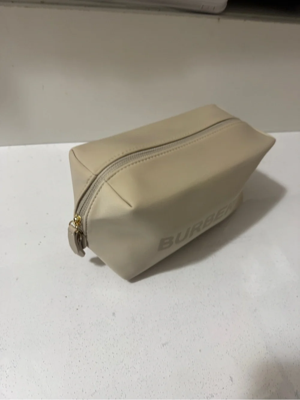 Burberry Beige Leather Pouch. This bag was a VIP gift received from shopping